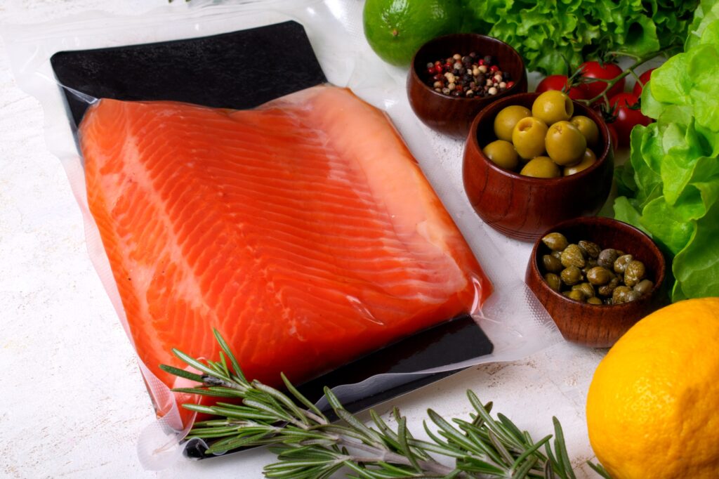 Vacuum packed cold smoked trout fillet